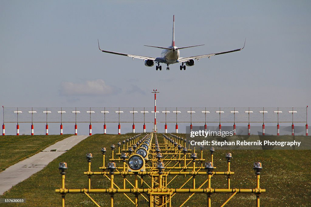 A plane approaching the runway