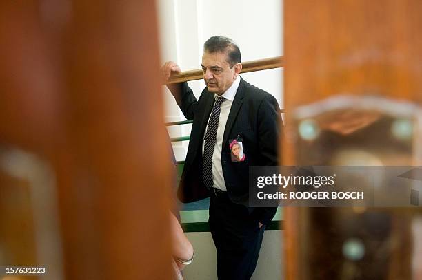 Vinod Hindocha, the father of murdered tourist Anni Dewani, stands outside the courtroom, at the High Court of Cape Town on December 5, 2012 for...