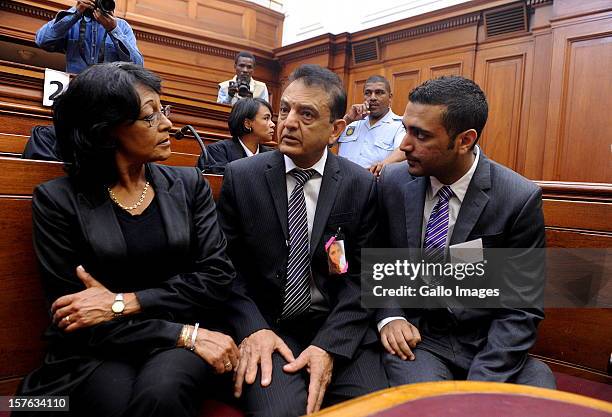 Vinod Hindocha, father of murdered Anni Dewani is supported by family members at the Cape Town High Cour at the Cape Town High Court on December 5,...