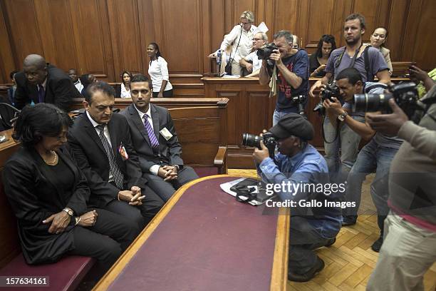 Members of the media photograph Vinod Hindocha , father of murdered Anni Dewani, ahead of the sentencing of Xolie Mngeni on December 5, 2012 in Cape...