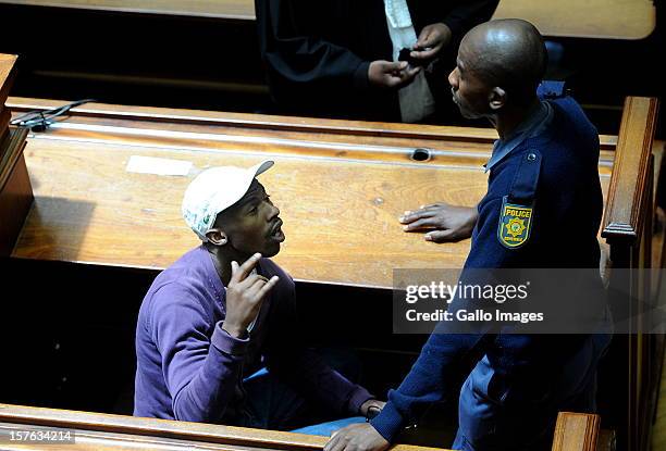 Xolile Mngeni in the Cape Town High Court on December 5, 2012 in Cape Town, South Africa. Mngeni was sentenced to life in prison for the murder of...