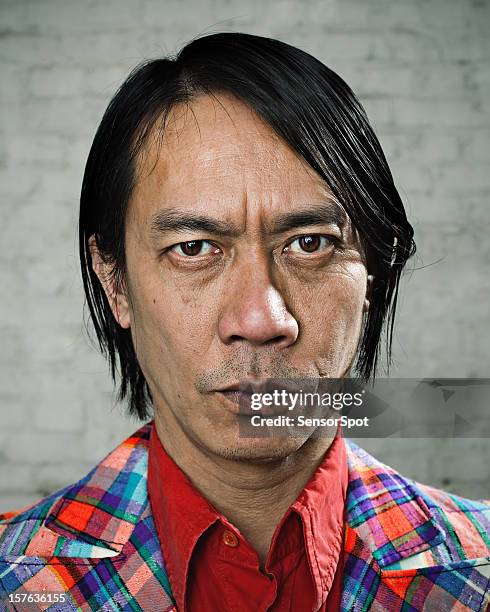 serious man with weird suit - ugly face stockfoto's en -beelden