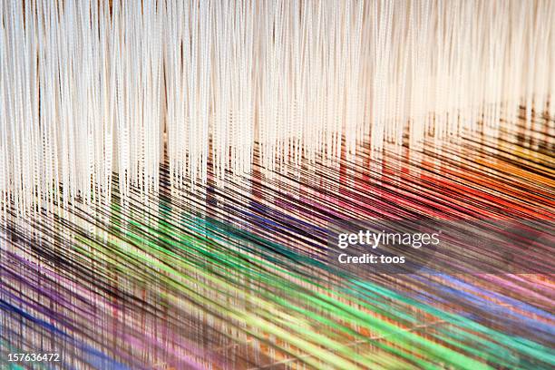 colorato filetti su un telaio (xxl - textile industry foto e immagini stock