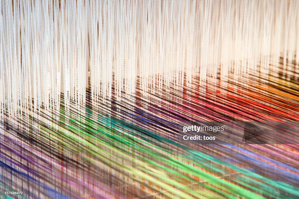 Colorful threads on a loom (XXL)