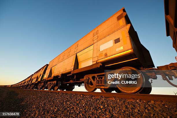 iron ore train cars close up - mining western australia stock pictures, royalty-free photos & images