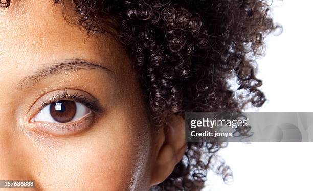 close-up of african american woman - brown eyes stock pictures, royalty-free photos & images