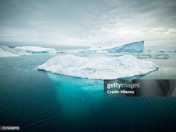 arctic icebergs greenland xxxl - ice berg stock pictures, royalty-free photos & images