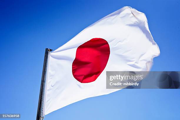 japanese flag on pole - japanese flag stock pictures, royalty-free photos & images