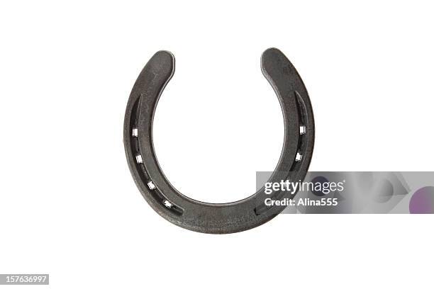 lucky horseshoe isolated on white background - horseshoes stockfoto's en -beelden