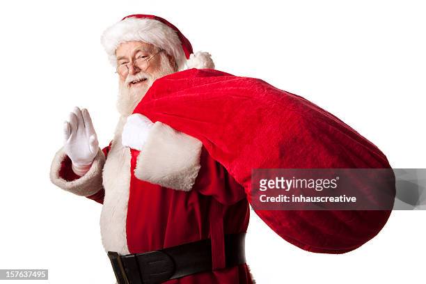 pictures of real santa claus has a gift bag - santa waving stock pictures, royalty-free photos & images