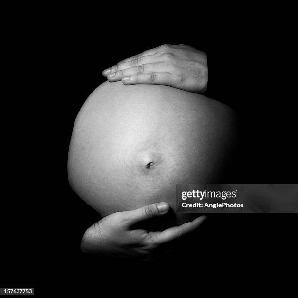 pregnant woman - pregnant belly stockfoto's en -beelden