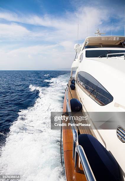 luxury yacht sailing at sea - motor yacht stock pictures, royalty-free photos & images