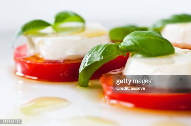 delicious caprese salad - caprese salad stock pictures, royalty-free photos & images