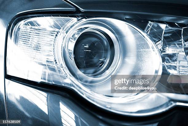 modern car xenon headlight - headlight stock pictures, royalty-free photos & images