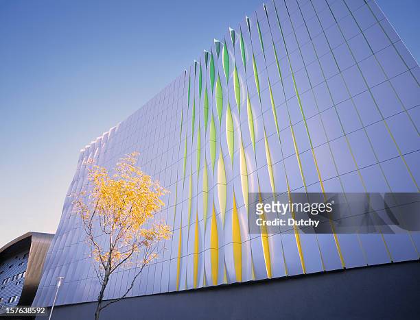 colorful wall of modern office building. - groningen stad stockfoto's en -beelden