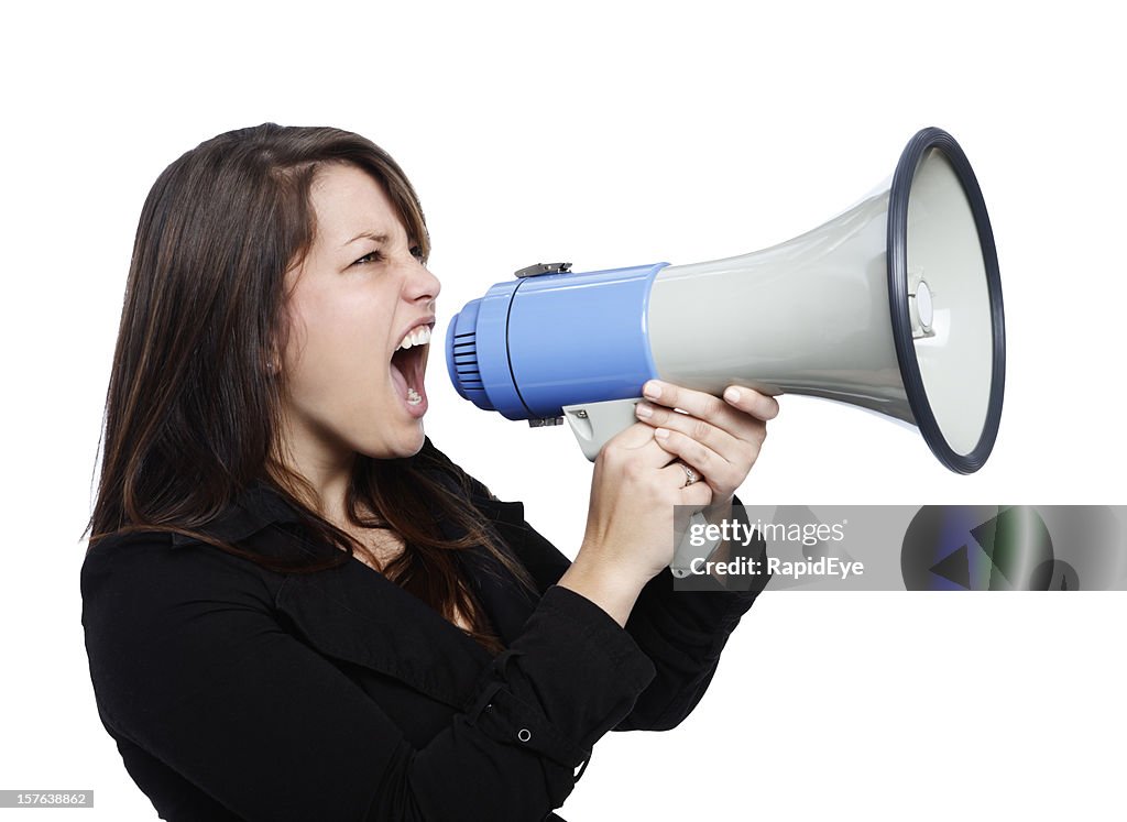 Pretty young brunette in profile shouting through loud hailer