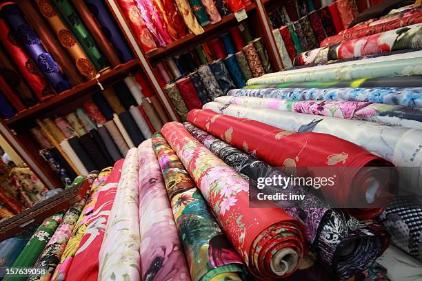 silk clothes rolls - textile printing stock pictures, royalty-free photos & images