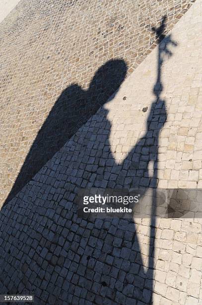 the shadow of pope john paul ii statues - pope stock pictures, royalty-free photos & images