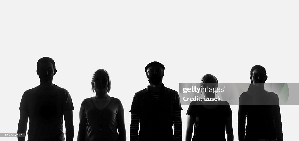 Five silhouettes of people