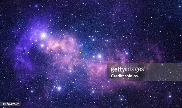 purple space stars - night stock pictures, royalty-free photos & images