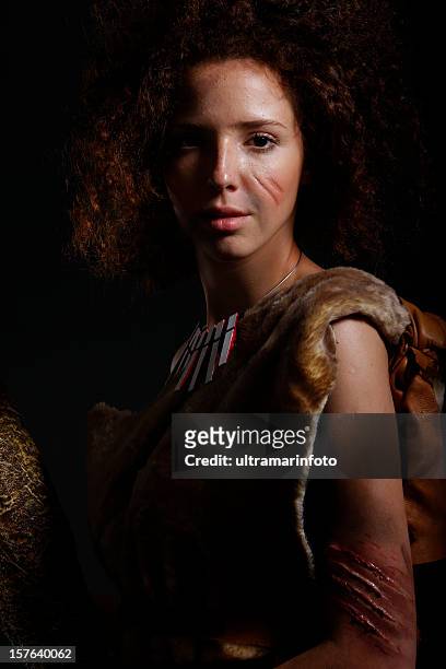 cavewoman - stone age stock pictures, royalty-free photos & images