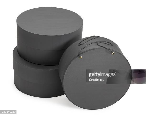 three round dark grey hat boxes with clipping path - hatbox stock pictures, royalty-free photos & images