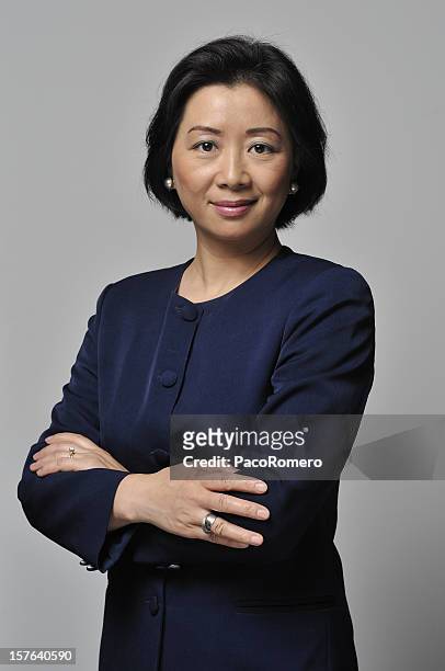confident asian business woman - grey blouse stock pictures, royalty-free photos & images