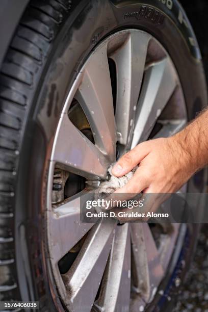 Man Cleaning Rims 62 Cleaning Rims Car Stock Photos, High-Res Pictures, and Images ...