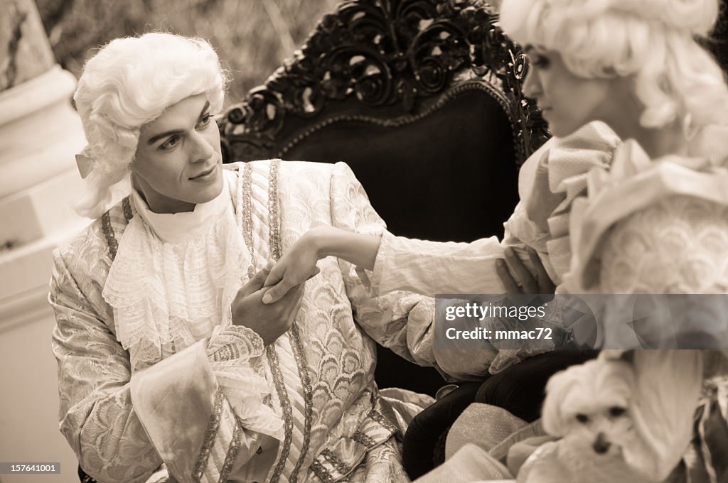 Kissing Hand in Old French Costumes