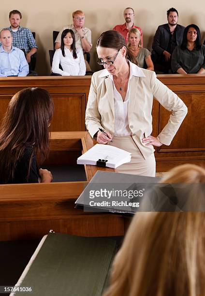 lawyer in a courtroom - witness trial stock pictures, royalty-free photos & images