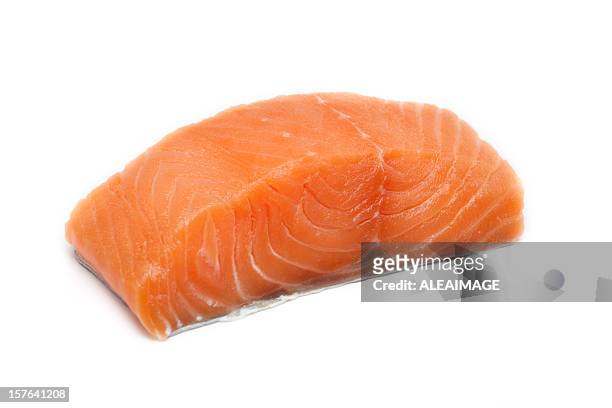 a large pink salmon fillet isolated on a white background - raw fish stockfoto's en -beelden