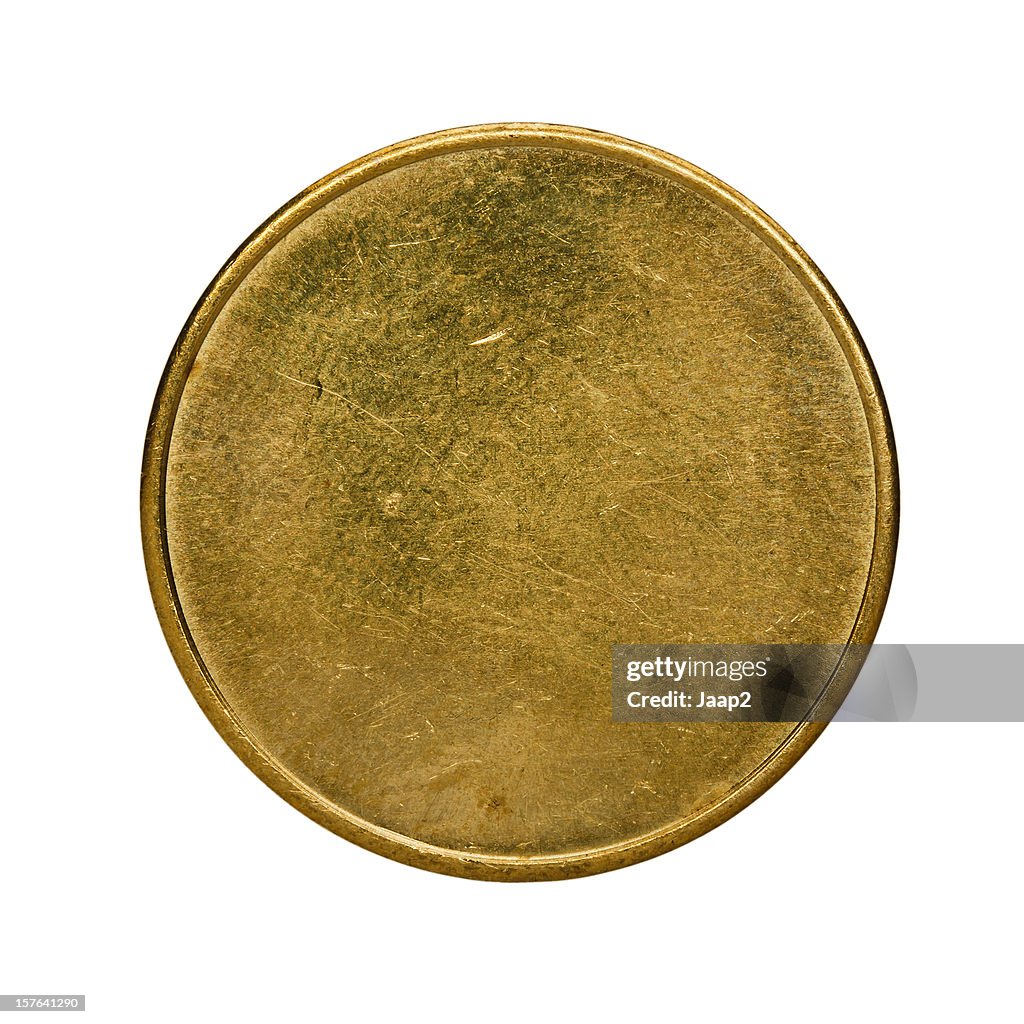 Single used blank brass coin, top view isolated on white