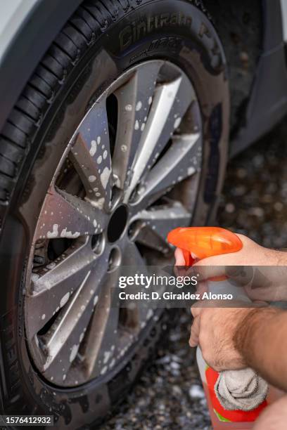 Man Cleaning Rims 62 Cleaning Rims Car Stock Photos, High-Res Pictures, and Images ...