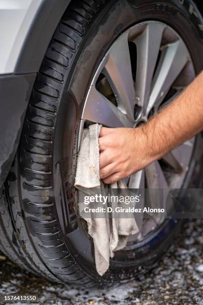 Man Cleaning Rims 62 Cleaning Rims Car Stock Photos, High-Res Pictures, and Images ...