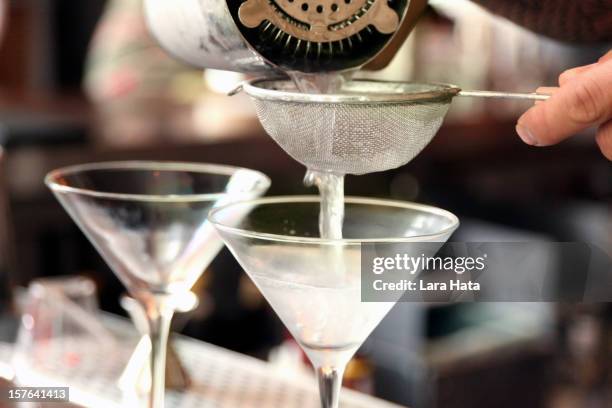 pouring martinis - wodka stock pictures, royalty-free photos & images