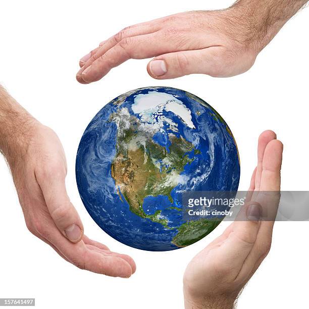 if our world protects - world hands stock pictures, royalty-free photos & images