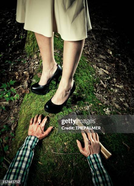 serial killer woman in the crime scene - axe murderer stock pictures, royalty-free photos & images