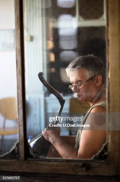 instrument maker's studio - middle eastern culture stock pictures, royalty-free photos & images