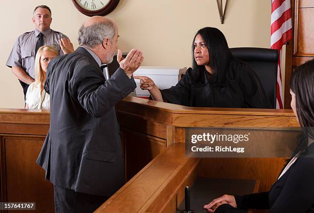 lawyer in a courtroom - lawyers arguing stock pictures, royalty-free photos & images