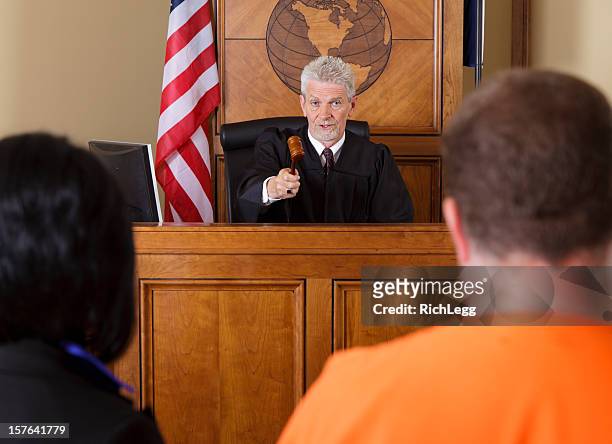 accused criminal and lawyer in a courtroom - judge bench stock pictures, royalty-free photos & images