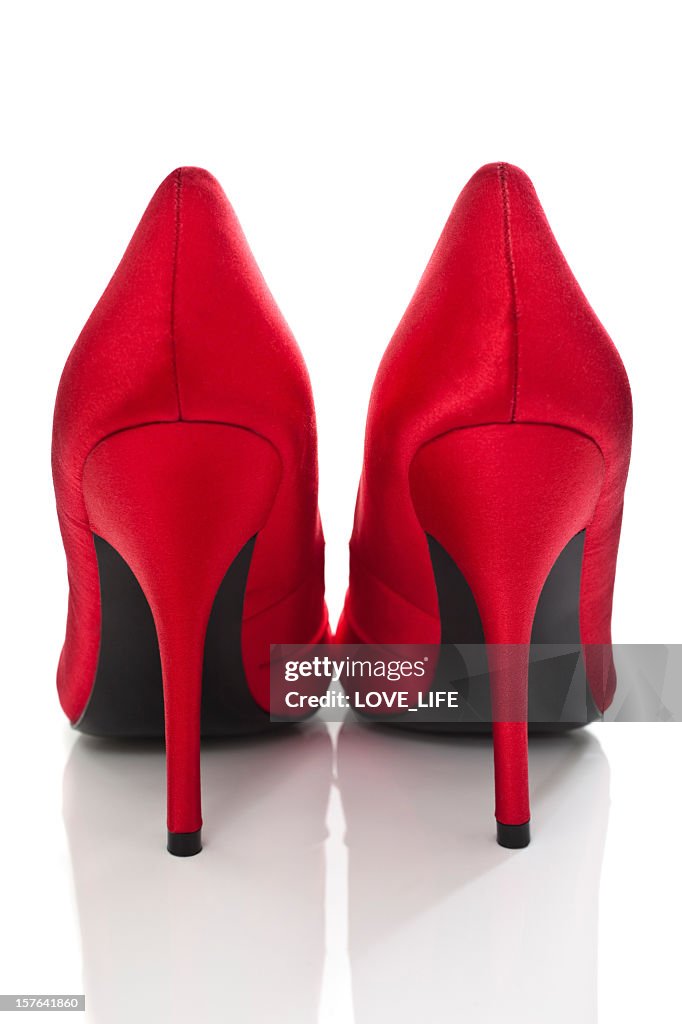Rear view of a pair of red high-heeled shoes