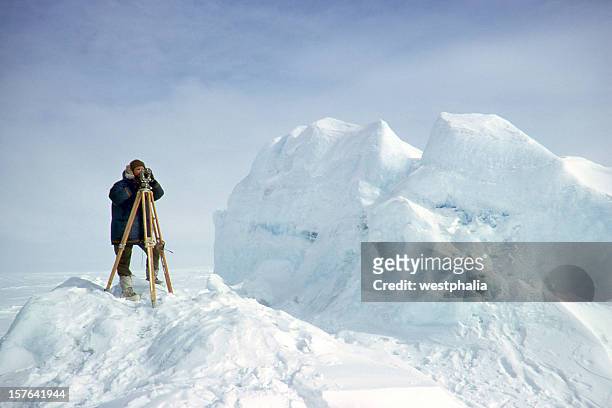 surveyor in the arctic - arctic stock pictures, royalty-free photos & images