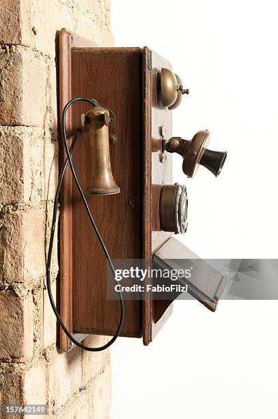 antique wall phone - fabio filzi stock pictures, royalty-free photos & images