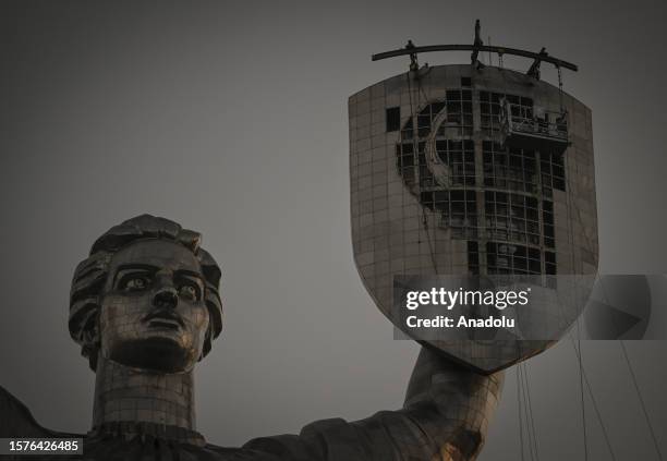 View of dismantling works of a hammer and sickle from a gigantic sculptural figure of giant Soviet-era symbols, built to commemorate the Nazi-Soviet...