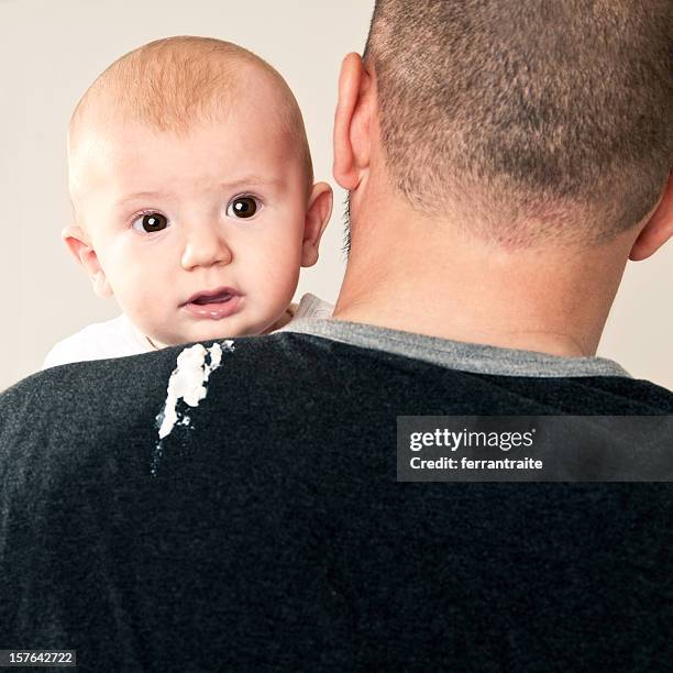 baby burp - vomit stock pictures, royalty-free photos & images