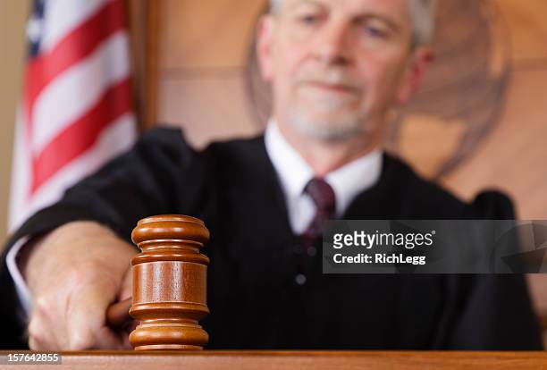 judge in a courtroom - judge bench stock pictures, royalty-free photos & images