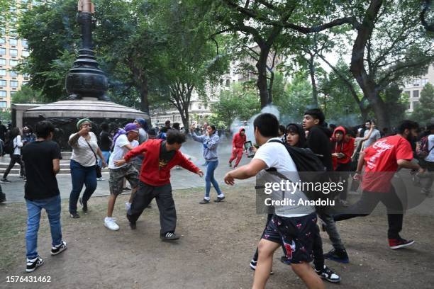 Attendees brawl during the gift distribution event held by phenomenon YouTube and Twitch broadcaster Cenat at the Union Square in Manhattan, New...