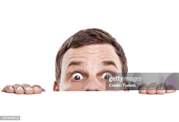 curioso guarda uomo - uomo buffo foto e immagini stock
