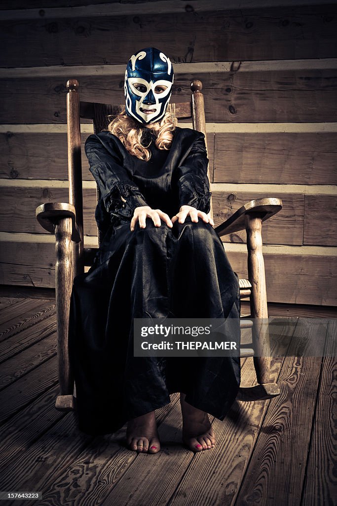 Lucha libre wrestler wife waiting in the porch