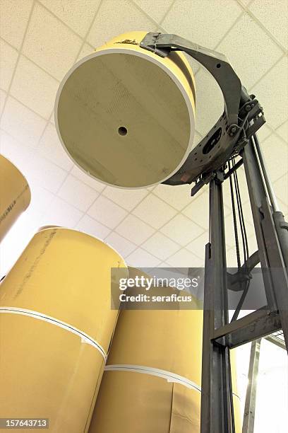 lifting spools of paper - rolled newspaper stock pictures, royalty-free photos & images